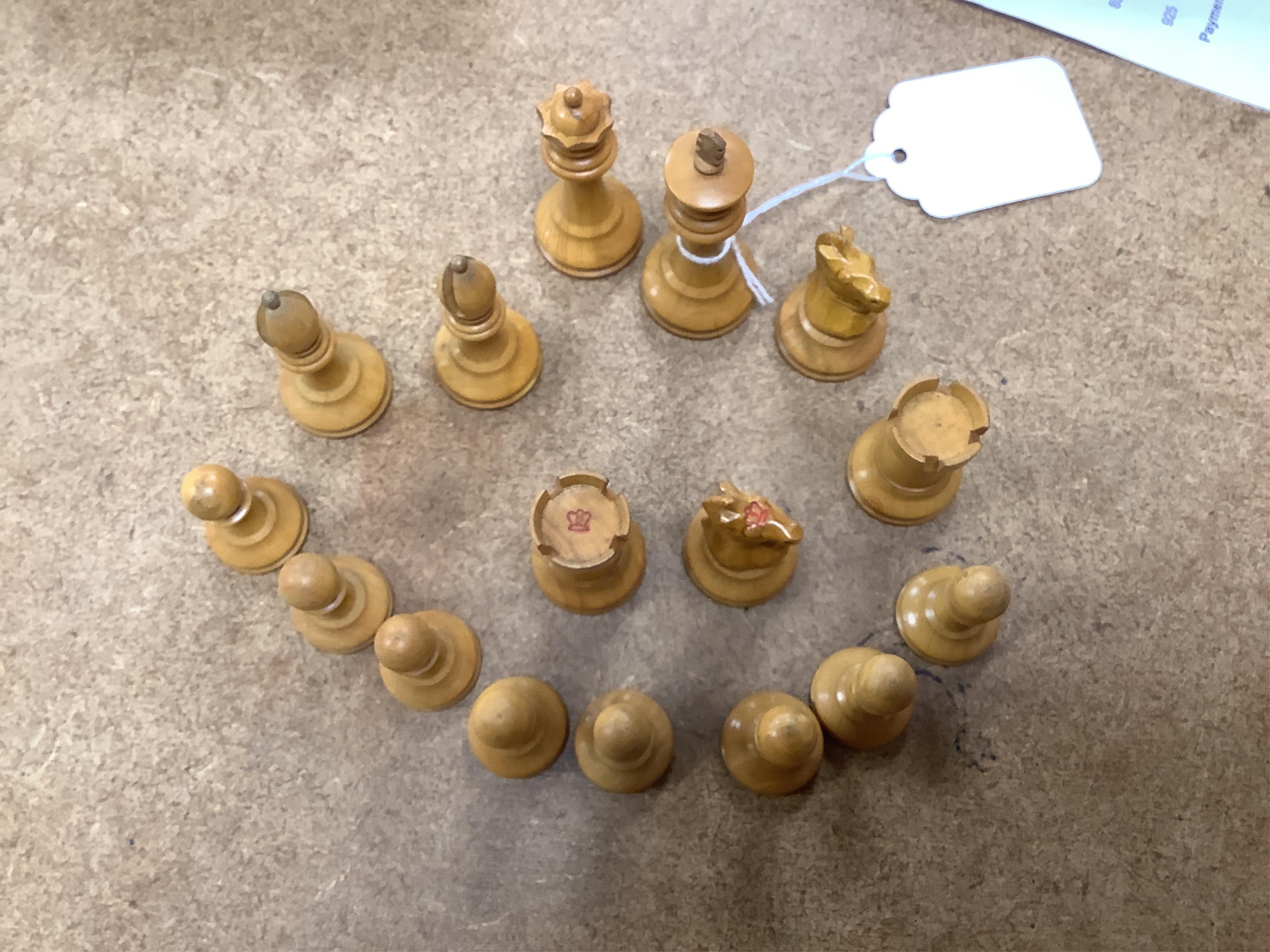 A chess set, possibly F H Ayres, in a mahogany box, and another larger weighted chess set, in box, Ayres Kings 6cm. Condition - good